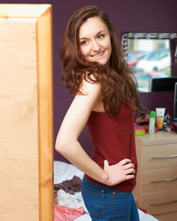 College girl trying on clothes